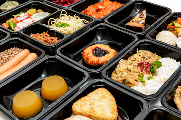 Healthy food and diet concept, restaurant dish delivery. Take away of fitness meal. Weight loss nutrition in foil boxes.