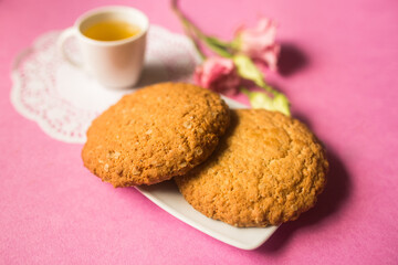 Pastry, cookies, cake, sugar dessert concept on pink background