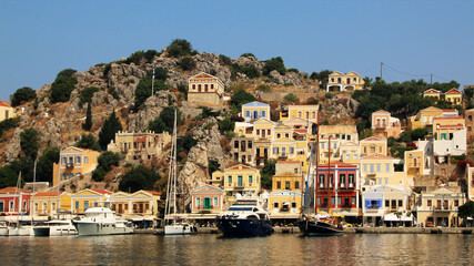 Symi town, Symi island, pictorial view of colorful houses and the harbour