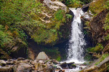 Waterfall in Himalaya mountains Nepal beautiful landscape
