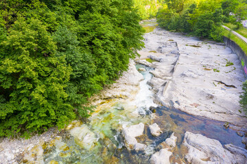 Drone view of the Serio river during the day, Val Seriana Bergamo.