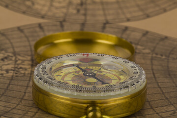 Compass on old paper, map
