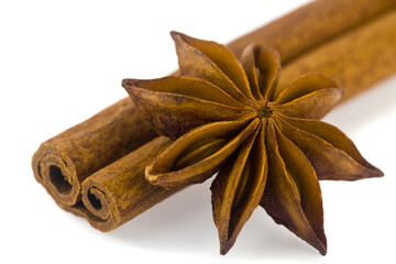 Fragrant star anise and cinnamon isolated on white background