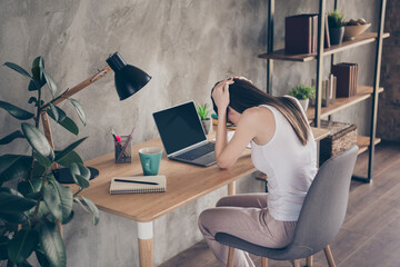 Back rear spine view photo of frustrated girl marketer work remote laptop do company development...