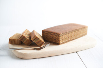 traditional Indonesian kek lapis or layered cake isolated with white background