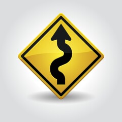 left winding road sign