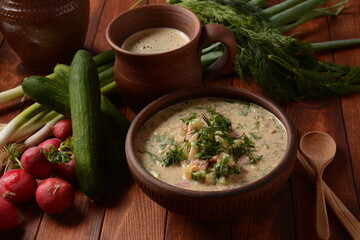 Russian cuisine- Okroshka, Summer light cold yogurt soup with cucumber, radish, eggs and dill with...