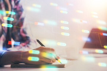 Double exposure of woman's writing hand on background with data technology hud. Big data concept.
