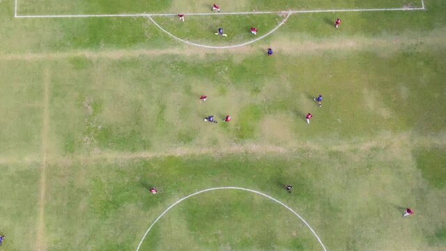Stunning oom out aerial image of amateur football match. São Paulo, Brazil.