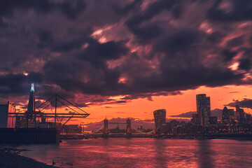 Long exposure Skyline during sunset. Shard, tower bridge and the city of London along the Thames