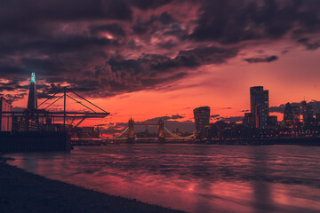 Obraz premium Long exposure Skyline during sunset. Shard, tower bridge and the city of London along the Thames
