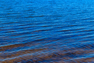 Water texture background. Surface of the river