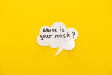 top view of speech bubble with where is your mask lettering on yellow background