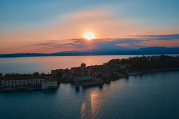 Naklejka na ściany i meble Sirmione, Lake Garda, Italy. Sunset over Sirmione Castle