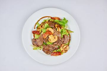 A bowl of food on a plate