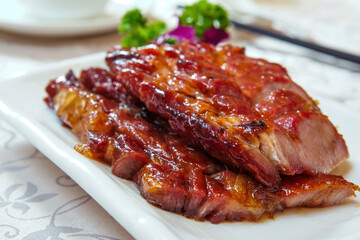 Cut Barbecued Pork On The Plate