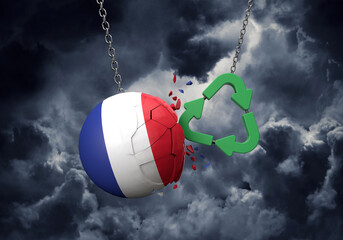 Obraz premium Green recycle symbol crashing into a France flag ball. 3D Rendering