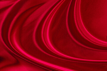 Black red satin dark fabric texture luxurious shiny that is abstract silk cloth background with patterns soft waves blur beautiful.