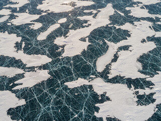 Baikal water lake winter season aerial view with sunrise sky, Russia natural landscape.