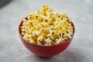 Salted Cheese Popcorn in a Brown Bowl.