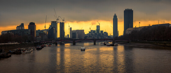 Panorama of the London skyline at sunset from Westminster Bridge on the River Thames