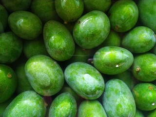 Fresh raw mangoes in the market