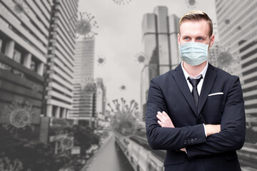 Business man standing wearing face shield or disposable face mask to help prevent Coronavirus(Covid-19) or Air dust pollution in the city background concept.