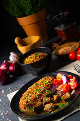 Buckwheat groats baked in the oven with beef goulash