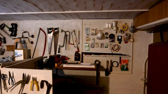 A view of tools in a workshop in a basement