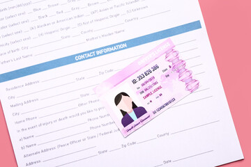Driving license with application form on color background