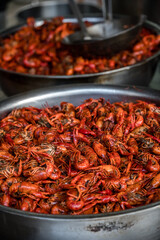 Cooked and fried red spicy chili prawns