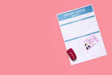 Driving license with application form and car key on color background