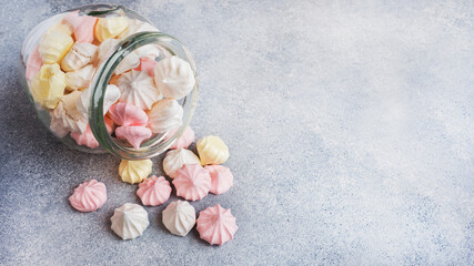 Small home meringue in a glass jar. Homemade Meringue. Copy space. - obrazy, fototapety, plakaty