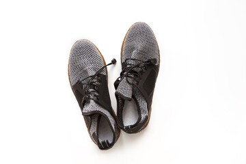 Unbranded modern sneakers isolated on a white background. Top view.