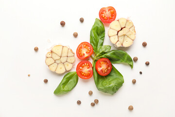 Composition with basil, tomatoes and spices on white background