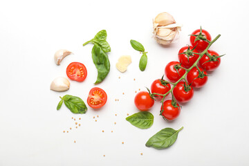 Composition with basil, tomatoes and spices on white background