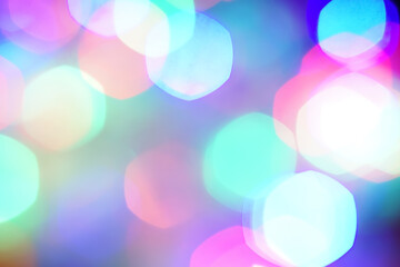 Colorful bokeh in the dark background, beautiful bright colors, celebration lights, party lights, christmas tree lights, blinking, flickering lights.
