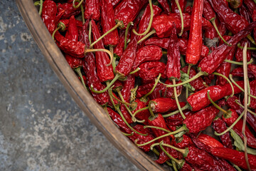 Chili drying in a wicker bowl