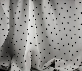 Polka dot black and white background