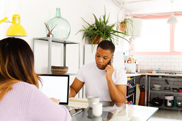 Interracial couple working from home