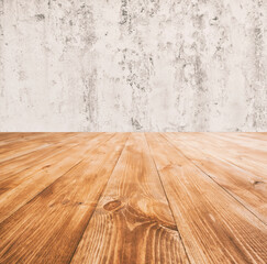 The room with gray cercement wall and wooden floor with lots of planks