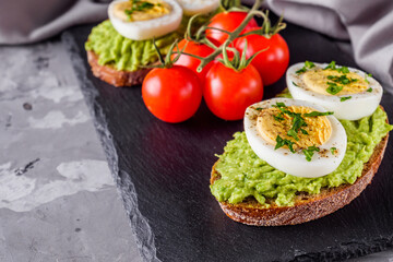 tasty and nutritious avocado sandwich and boiled egg
