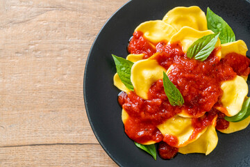 Ravioli with tomato sauce and basil