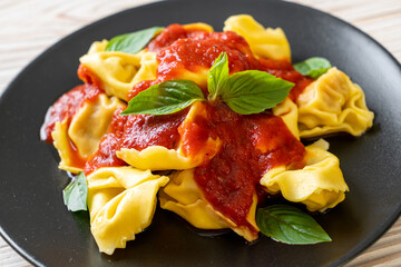 Italian tortellini pasta with tomato sauce