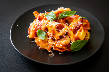 Italian tortellini pasta with tomato sauce