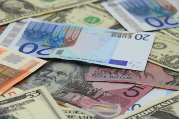 Obraz na płótnie Canvas Background of international paper money.