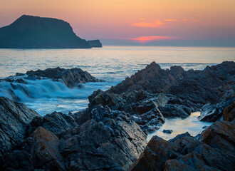 Beautiful Swirling Seas Hit the British Coast at Sunset