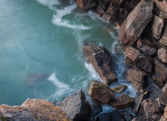 Beautiful Swirling Seas Hit the British Coast at Sunset