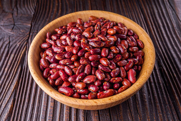 Fresh organic natural beans on wooden rustic background