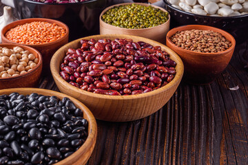 Fresh organic natural beans on wooden rustic background